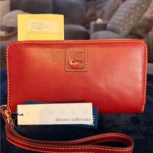 Dooney & Bourke Florentine large zip wallet in bourdoex like new..